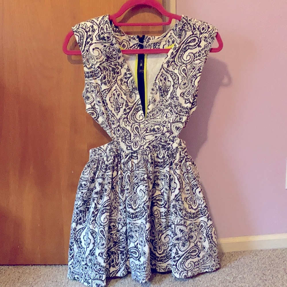 SOLD NWOT. Cutout B&W print skater dress- never worn!!